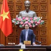 Thủ tướng Phạm Minh Chính chủ trì cuộc họp Thường trực Chính phủ về bình ổn giá xăng dầu. (Ảnh: Dương Giang/TTXVN)