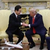 Tổng thống Lee Jae Myung (trái) trong cuộc hội đàm với Tổng thống Mỹ Donald Trump tại Washington DC., ngày 25/8/2025. (Ảnh: Yonhap/TTXVN)