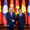 Tổng Bí thư Tô Lâm và Tổng Bí thư, Chủ tịch nước Lào Thongloun Sisoulith đồng chủ trì Cuộc gặp cấp cao giữa Đảng Cộng sản Việt Nam và Đảng Nhân dân Cách mạng Lào. (Ảnh: Thống Nhất/TTXVN)