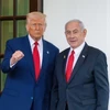 Tổng thống Mỹ Donald Trump (trái) và Thủ tướng Israel Benjamin Netanyahu tại cuộc gặp ở Nhà Trắng, Washington, DC. (Ảnh: IRNA/TTXVN)