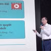 Ông Trần Tiến Duẩn, Tổng Biên tập Báo Điện tử VietnamPlus (TTXVN) trình bày tham luận “Dữ liệu số và báo chí đa ngôn ngữ trong quảng bá du lịch Việt Nam." (Ảnh: Thanh Thủy/TTXVN)