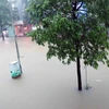 Các tuyến đường ở Thái Nguyên ngập sâu trong nước do cơn mưa kéo dài từ 19h ngày 20/6. (Ảnh: Trần Trang/TTXVN)