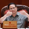 Thủ tướng Phạm Minh Chính chủ trì cuộc họp về triển khai chiến dịch xây dựng trường học cho các xã biên giới. Ảnh: Dương Giang-TTXVN