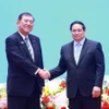 Thủ tướng Phạm Minh Chính và Thủ tướng Nhật Bản Ishiba Shigeru tại Diễn đàn doanh nghiệp Việt Nam-Nhật Bản. (Ảnh: Dương Giang/TTXVN)