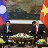 Tổng Bí thư Tô Lâm hội kiến Tổng Bí thư, Chủ tịch nước Lào Thongloun Sisoulith. (Ảnh: Thống Nhất/TTXVN)