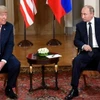 Tổng thống Nga Vladimir Putin (phải) và Tổng thống Mỹ Donald Trump trong cuộc gặp tại Helsinki, Phần Lan ngày 16/7/2018. (Nguồn: THX/TTXVN)