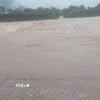 Nhiều ngầm tràn tại Quảng Trị bị ngập sâu trong nước. (Nguồn: TTXVN phát)