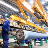 Hoạt động sản xuất tại xưởng sản xuất trụ bêtông ly tâm của doanh nghiệp có vốn đầu tư trực tiếp nước ngoài (FDI), khu công nghiệp chuyên sâu Phú Mỹ 3, thị xã Phú Mỹ, tỉnh Bà Rịa-Vũng Tàu. (Ảnh: Hồng Đạt/TTXVN)