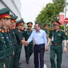 Lãnh đạo Tập đoàn Viettel chào mừng đồng chí Trưởng Ban Chính sách, chiến lược Trung ương và Đoàn công tác. (Nguồn: Vietnam+)