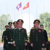 Chủ nhiệm Tổng cục Chính trị QĐND Việt Nam Trịnh Văn Quyết và Chủ nhiệm Tổng cục Chính trị QĐND Lào Vongsone Inpanphim. (Ảnh: Trọng Đức/TTXVN)
