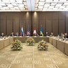 Đại diện các nước Nga, Mỹ, Ukraine cùng nước chủ nhà Thụy Sĩ tham dự vòng đàm phán mới tại Geneva. (Nguồn: TTXVN phát)