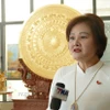 Bà Phạm Thị Minh Hường, Chủ tịch Hội đồng quản trị kiêm Tổng Giám đốc Công ty Gold Phuc, Ủy viên Ban Thường vụ Tổng hội người Việt Nam tại Lào, Phó Chủ tịch Hiệp hội Doanh nhân Việt Nam ở nước ngoài, bày tỏ niềm tin vào những thành tựu mà Việt Nam đã đạt được trong nhiệm kỳ vừa qua. (Ảnh: Xuân Tú/TTXVN)