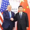 Tổng thống Mỹ Donald Trump trong cuộc gặp với Chủ tịch Trung Quốc Tập Cận Bình (phải) ngày 29/6/2019. (Ảnh: THX/TTXVN)