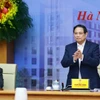 Thủ tướng Phạm Minh Chính chủ trì hội nghị thúc đẩy phát triển nhà ở xã hội. (Ảnh: Dương Giang/TTXVN)