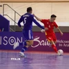 Một pha bóng trong trận ra quân gặp Kuwait của đội tuyển futsal Việt Nam. (Nguồn: TTXVN phát)