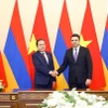 Chủ tịch Quốc hội Trần Thanh Mẫn và Chủ tịch Quốc hội Armenia Alen Simonyan chụp ảnh chung. (Ảnh: Doãn Tấn/TTXVN)
