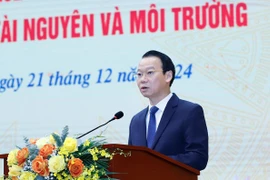 Bộ trưởng Bộ Tài nguyên và Môi trường Đỗ Đức Duy phát biểu tại hội nghị. (Ảnh: HV/Vietnam+)