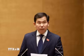 Ủy viên Ủy ban Thường vụ Quốc hội, Tổng Thư ký Quốc hội - Chủ nhiệm Văn phòng Quốc hội Lê Quang Mạnh trình bày dự thảo Nghị quyết Kỳ họp thứ nhất. (Ảnh: Tuấn Anh/TTXVN)