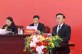 Thường trực Ban Bí thư Trần Cẩm Tú chủ trì họp báo quốc tế về Đại hội Đảng XIV. (Ảnh: Phương Hoa/TTXVN)