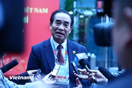 Nhà báo Việt kiều Nguyễn Huy Thắng, Tổng biên tập Báo Việt Đức và Truyền hình Việt-Đức VDTV, một gương mặt có uy tín trong cộng đồng người Việt tại Berlin. (Ảnh: Hùng Võ/Vietnam+)