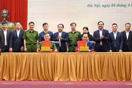 Lễ ký kết Biên bản ghi nhớ và kích hoạt kết nối, đồng bộ cơ sở dữ liệu ngành với Cơ sở dữ liệu tổng hợp quốc gia. (Ảnh: Kiều Chi)