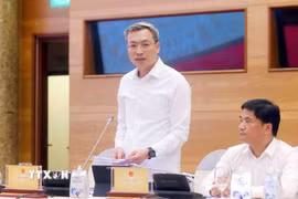 Thiếu tướng Nguyễn Quốc Toản, Chánh Văn phòng, Người phát ngôn Bộ Công an trả lời câu hỏi của phóng viên các cơ quan thông tấn, báo chí. (Ảnh: Phạm Kiên/TTXVN)