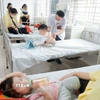 Tại Khoa Nhi Bệnh viện Bệnh nhiệt đới Trung ương đang điều trị cho hơn 50 bệnh nhi mắc cúm A. (Ảnh: Minh Quyết/TTXVN)