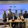 Đại diện Hiệp hội Tư vấn nâng cao sức khỏe Việt Nam và Trung tâm Đổi mới sáng tạo Quốc gia tổ chức Lễ ký kết Thỏa thuận hợp tác. (Ảnh: PV/Vietnam+)