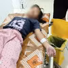 Bệnh nhân trong vụ ngộ độc được chăm sóc tại bệnh viện. (Ảnh: TTXVN phát)