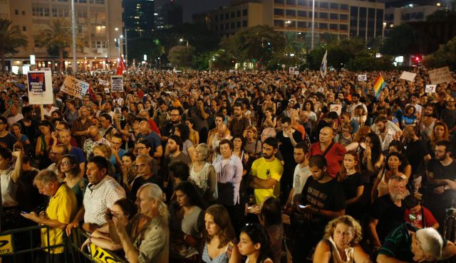 Người Israel tuần hành phản đối bạo lực nhằm vào người Palestine ảnh 1