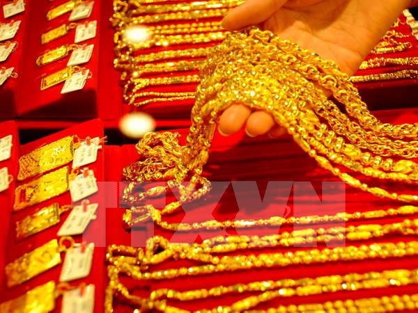 Giá vàng châu Á giảm xuống mức thấp nhất trong bốn tuần ảnh 1