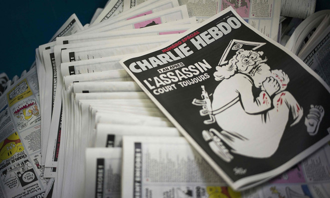 Số đặc biệt của Charlie Hebdo bị chỉ trích vì báng bổ Thượng đế ảnh 1