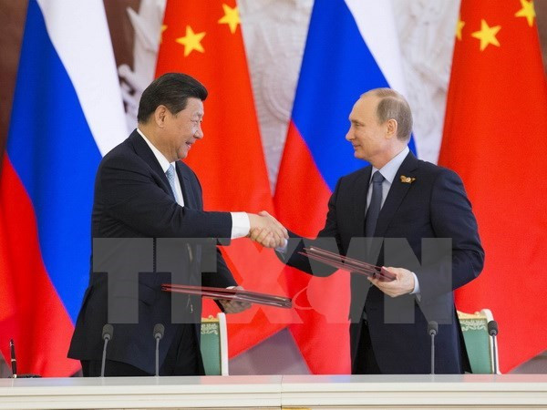 Tổng thống Putin: Sự thù địch Phương Tây thúc đẩy hợp tác Nga-Trung ảnh 1