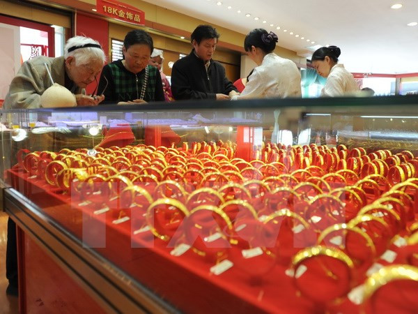 Thị trường vàng vẫn chịu sức ép trước triển vọng Fed nâng lãi suất ảnh 1