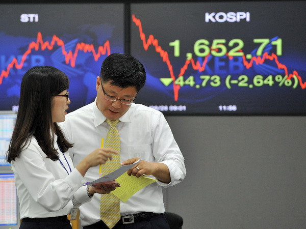 Chứng khoán châu Á giảm mạnh bất chấp tín hiệu tích cực từ Mỹ ảnh 1