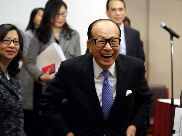 Tỷ phú giàu nhất châu Á đàm phán thâu tóm nhà mạng O2 ở Anh ảnh 1