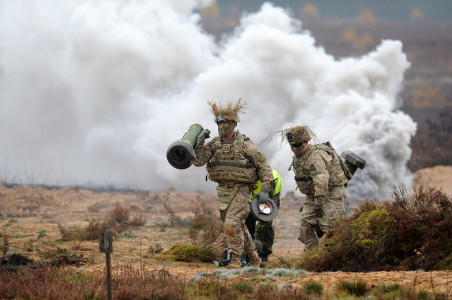 [Photo] Quân đội Litva-Mỹ phối hợp tập trận chung "Hunter 2014" ảnh 1