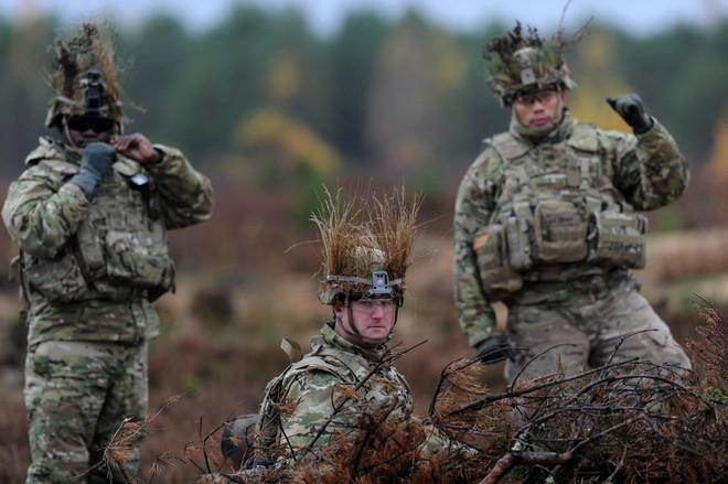 [Photo] Quân đội Litva-Mỹ phối hợp tập trận chung "Hunter 2014" ảnh 2
