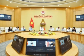 Toàn cảnh cuộc điện đàm trực tuyến. (Ảnh: Bộ Công Thương)