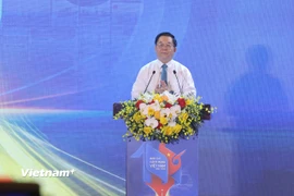 Ông Nguyễn Trọng Nghĩa, Ủy viên Bộ Chính trị, Bí thư Trung ương Đảng, Trưởng Ban Tuyên giáo và Dân vận Trung ương phát biểu khai mạc tại Hội Báo Toàn quốc. (Ảnh: Hoài Nam/Vietnam+)
