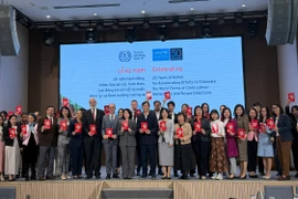 Các đại biểu tại lễ kỷ niệm 25 năm Việt Nam phê chuẩn Công ước số 182 của ILO về các hình thức lao động trẻ em tồi tệ nhất. (Ảnh: PV/Vietnam+)