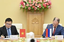 Ký kết Bản ghi nhớ giữa Bộ Công Thương Việt Nam và Nga về hợp tác nghiên cứu khoa học, phát triển công nghệ và đổi mới sáng tạo trong lĩnh vực công nghiệp. (Ảnh: Trần Việt/TTXVN)