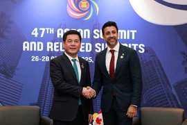 Bộ trưởng Bộ Công Thương Nguyễn Hồng Diên và Bộ trưởng Thương mại quốc tế Canada Maninder Sidhu. (Ảnh: Bộ Công Thương)