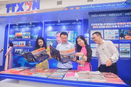 Gian trưng bày của Thông tấn xã Việt Nam tại Hội Báo toàn quốc năm 2025 giới thiệu thành tựu nổi bật trong chặng đường 80 xây dựng và phát triển với thông điệp “Nguồn tin chính thống, dòng tin chủ lực". (Ảnh: Hoài Nam/Vietnam+)