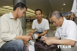 Lao động Việt Nam đi làm việc ở nước ngoài. (Ảnh: TTXVN)