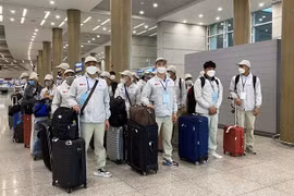 Lao động Việt Nam chuẩn bị đi làm việc ở nước ngoài. (Ảnh: PV/Vietnam+)