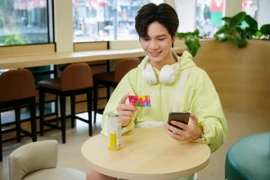 Người dùng được miễn phí mở và duy trì tài khoản, miễn phí chuyển tiền và thanh toán trên App Cake, sử dụng số điện thoại làm số tài khoản - dễ nhớ. (Ảnh: Vietnam+)