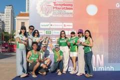 Đại diện từ nhãn hàng Nestlé MILO hào hứng tham dự giải chạy. (Ảnh: PV/Vietnam+)