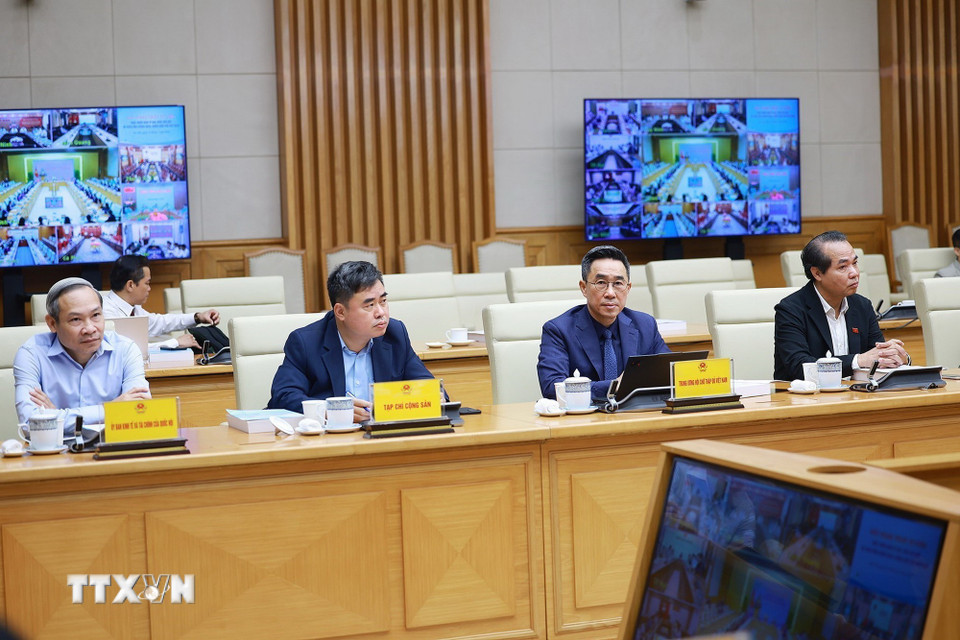 Các đại biểu dự Hội nghị trực tuyến về kinh tế bạc. (Ảnh: Dương Giang/TTXVN)