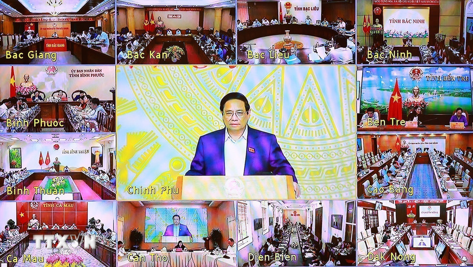 Thủ tướng Phạm Minh Chính chủ trì Phiên họp lần thứ tư của Ban Chỉ đạo xóa nhà tạm, nhà dột nát trực tuyến đến các địa phương. (Ảnh: Dương Giang/TTXVN)